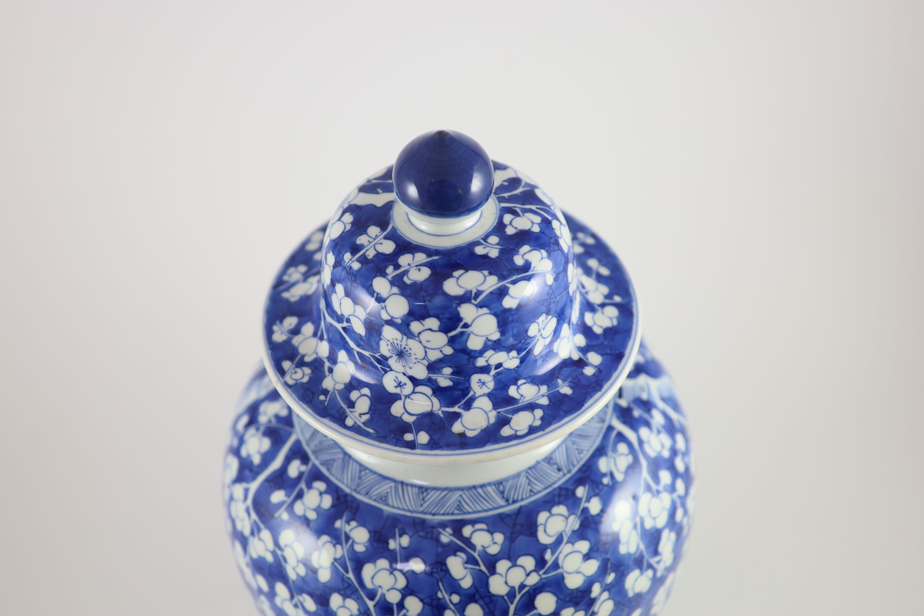 A good Chinese blue and white ‘prunus and cracked ice’ vase and cover, Kangxi period